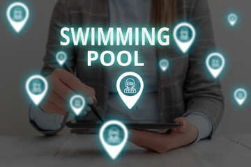 Text sign showing Swimming Pool. Business photo text Structure designed to hold water for leisure activities Woman wear formal work suit presenting presentation using smart device