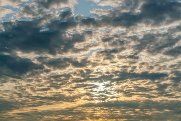 Obraz premium Mystical sky with dark clouds at sunset. Very beautiful evening time. Golden hour.