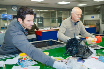 male workers in recycling center