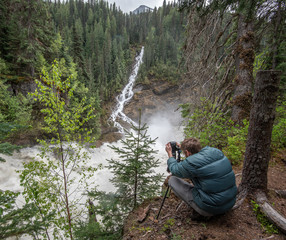 A photographer at Morkill Falls, BC, Canada