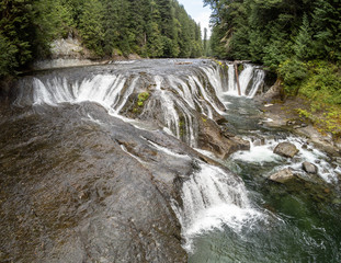 Fototapeta na wymiar Wonderful aerial pictures of Middle Lewis River Falls on the rugged Lewis River in Skamania County and the Gifford Pinchot National Forest in Washington State.