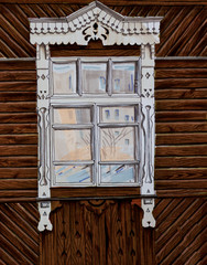 window in a wooden house and reflex