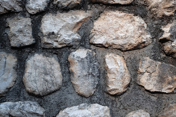 Old stone wall as background, closeup view