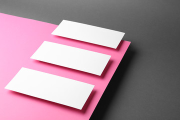 Empty sheets on color background. Mockup for design