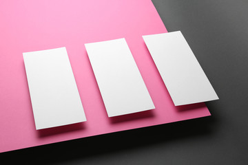 Empty sheets on color background. Mockup for design