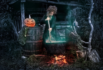 Old witch in her barn brewing potions
