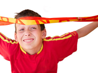 Young supporter boy with shirt of the spanish soccer team
