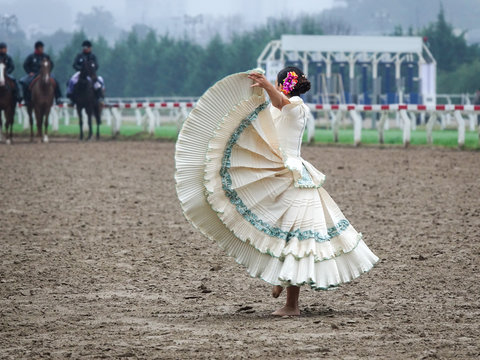 Argentinian traditional festival with gauchos and paisanas