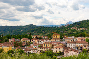 Fototapeta na wymiar Tuscany. Barga city, a more modern part. An old hill town in Italy.