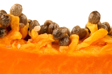 Slices of ripe papaya on white background. Health, vegetarian.