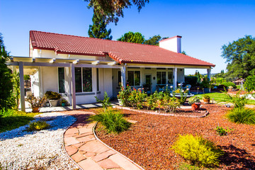 Rear Exterior Of Home With Drought Tolerant Plants