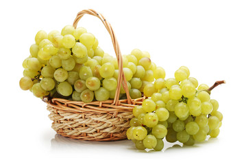 Fresh grape fruits with green leaves isolated on white background