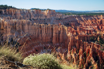 The spectacle of thousands of glowing orange earthen spires concentrated in the valley below the...