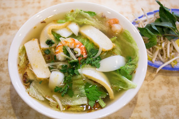 Vietnamese seafood noodle soup in the bowl