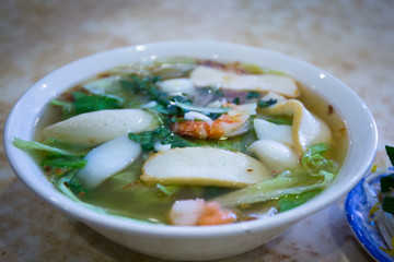 Vietnamese seafood noodle soup in the bowl