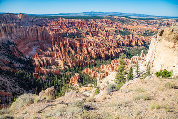 The spectacle of thousands of glowing orange earthen spires concentrated in the valley below the...