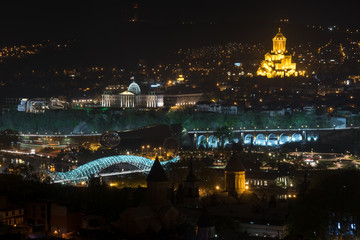 Night view of Tsminda Sameba Cathedral from Sololaki Hill in Tbilisi
