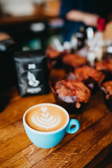 cup of coffee on wooden table