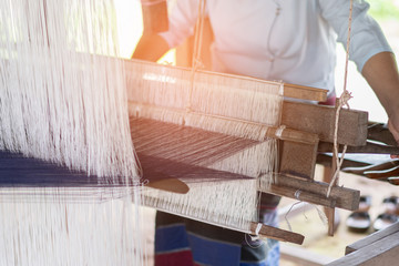 Household Weaving machine Asia weave silks cotton on the manual wood loom in Laos ,Thailand,...
