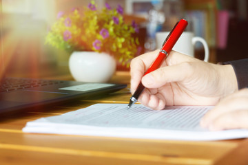 editing text on desk in office