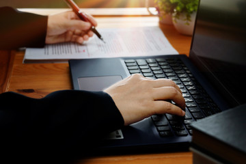 editing text on desk in office