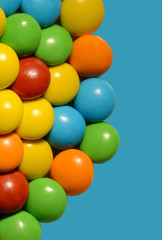 Colorful button-shaped candies filled with chocolate