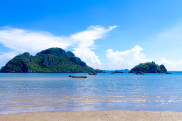 Beach with sky and fishing boat at Baan Koh Teap