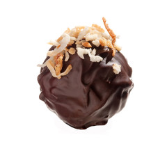 dark chocolate truffle with coconut garnish