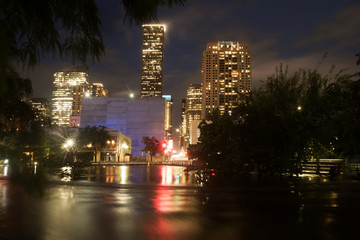 TROPICAL DEPRESSION IMELDA. Houston flood. Night city reflected in high water