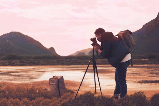 photographer at sunset