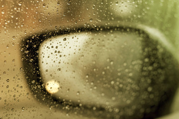 Raindrops on the windshield of car
