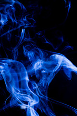 Blue toxic fumes movement on a black background.