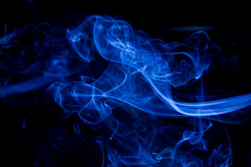Blue toxic fumes movement on a black background.