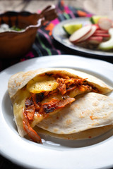 Mexican quesadilla with pork also called 
