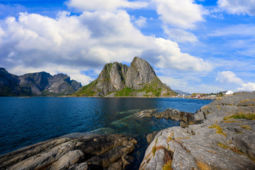 Mountain and sea views in the Hamnoy fishing village. This is a popular tourist destination for tourists and photographers in the Lofoten Islands, Norway.