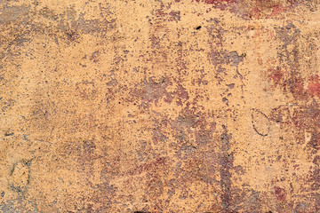 Texture of a concrete wall with cracks and scratches which can be used as a background