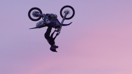 Extreme Sport Motocross freestyle backflip on big jump - Powered by Adobe