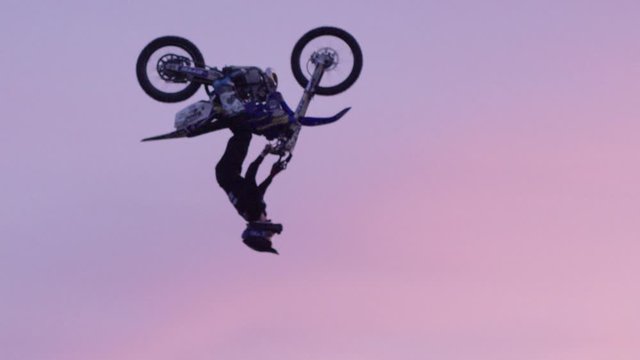 Extreme Sport Motocross freestyle backflip on big jump