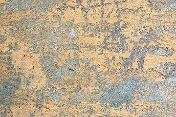 Texture of a concrete wall with cracks and scratches which can be used as a background