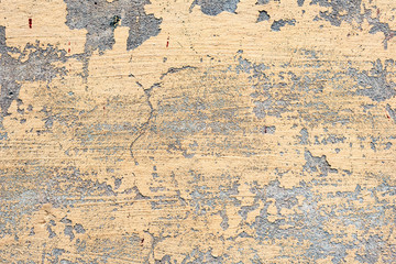 Texture of a concrete wall with cracks and scratches which can be used as a background