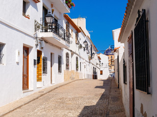 Beautiful narrow street of the old town of Altea. Spain.