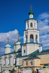 The bell tower of the old Orthodox Christian Cathedral in Kazan. Religion, faith in God. Tourism and travel, viewing of historical sights.