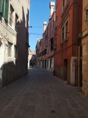 Fototapeta premium narrow street in venice italy