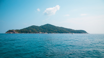 Fototapeta na wymiar Similan Islands, Andaman Sea, Thailand, National park, beautiful blue sea. White boats with tourists.