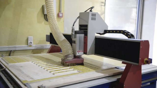 Engraving CNC milling machine in the process.