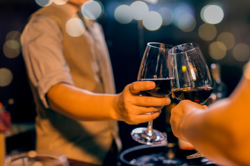 bartender pouring drink in bar