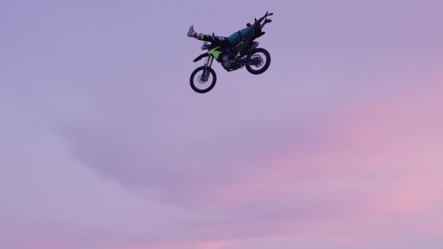 Extreme Sport Motocross freestyle backflip on big jump