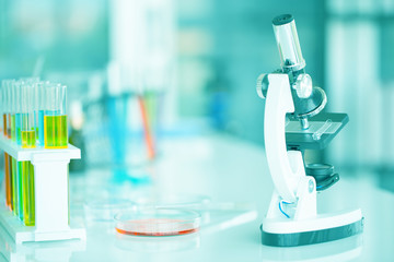 Chemical tube set development and pharmacy in laboratory with green bokeh through windows