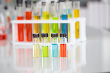 Chemical tube set development and pharmacy in laboratory with green bokeh through windows