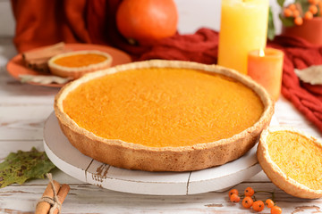 Tasty pumpkin pies on wooden background © Pixel-Shot